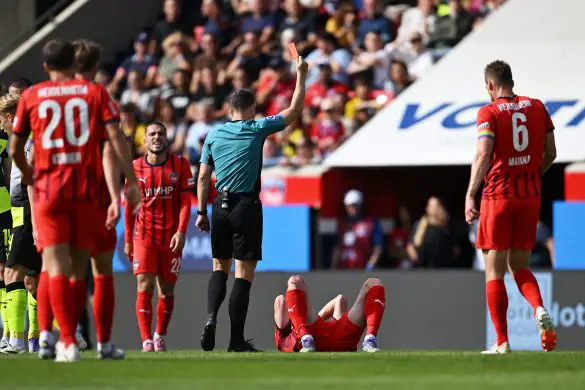 Heidenheim's Budu Zivzivadze being shown a straight red card on Saturday.