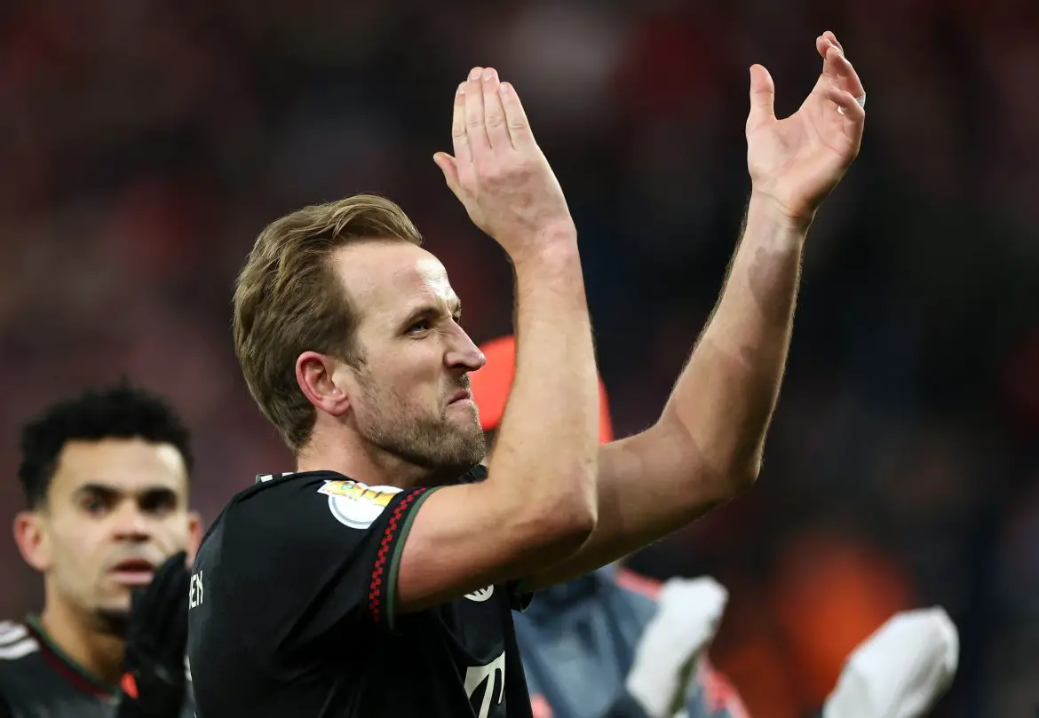 Harry Kane applauds the travelling Bayern Munich fans after DFB Pokal win against Union Berlin.