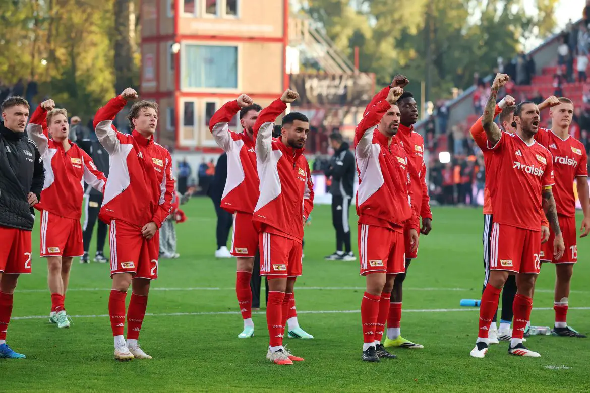 Union Berlin players celebrate their first Bundesliga victory of the 2026/27 season with their hometown fans.