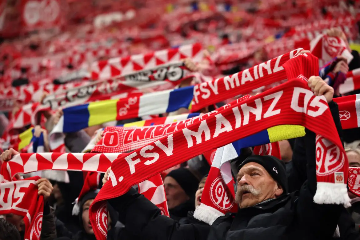 Fans of Mainz 05 show their support prior to a Bundesliga match.