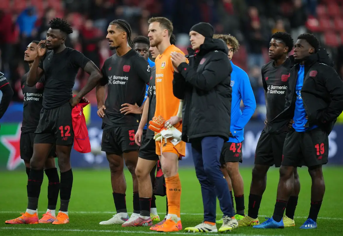 A dejected Bayer Leverkusen after their defeat against PSG in the Champions League.