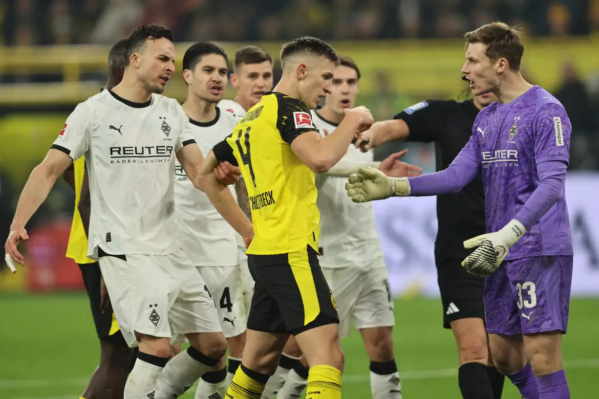 Dortmund beat Gladbach in a tense game.