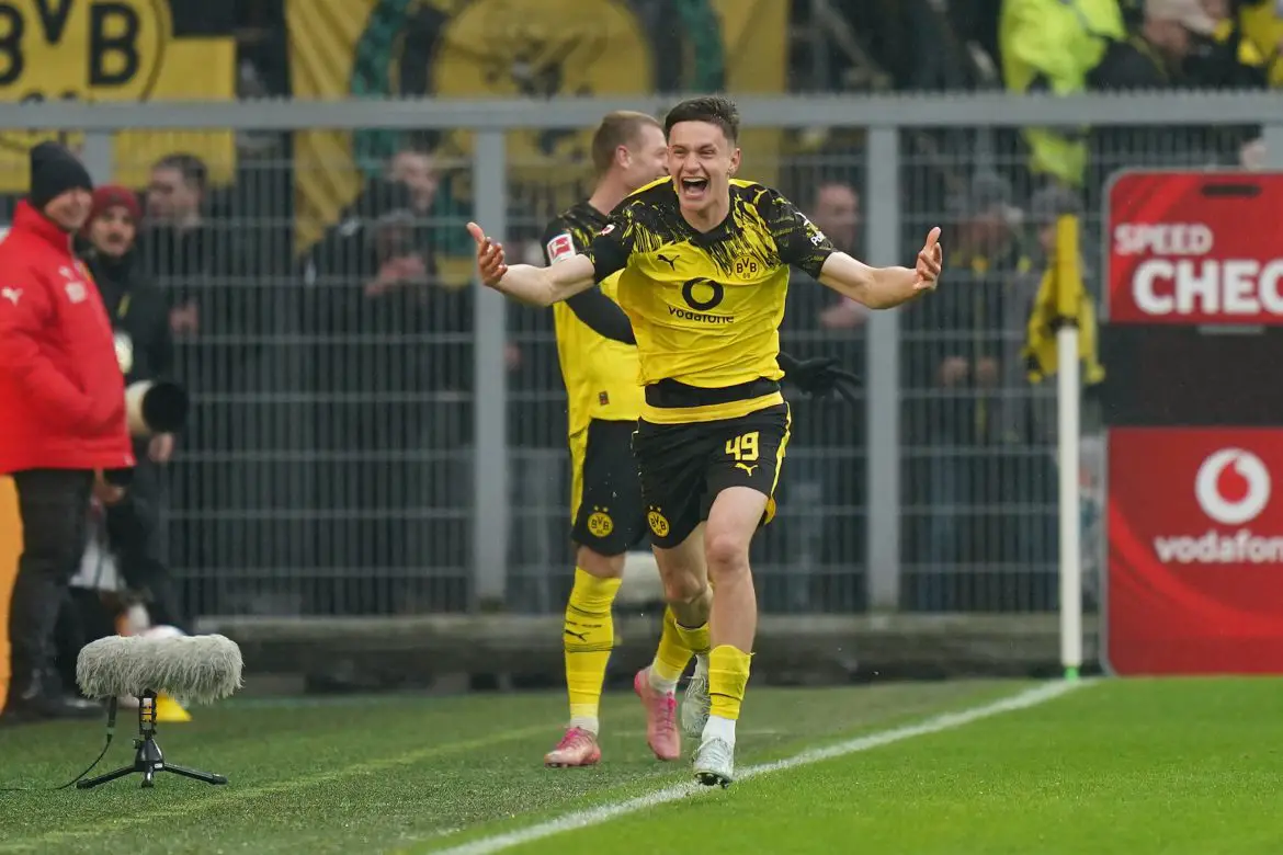 Borussia Dortmund's Luca Reggiani celebrates scoring his first Bundesliga goal.