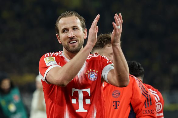 Bayern Munich striker Harry Kane celebrates victory in the Bundesliga.
