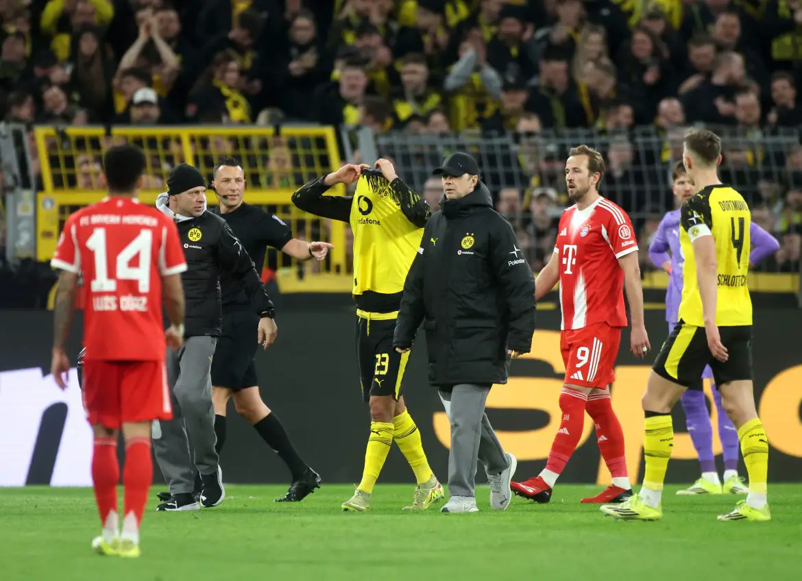 Borussia Dortmund captain Emré Can exits Saturday evening's Bundesliga Top-Spiel against Bayern Munich injured.