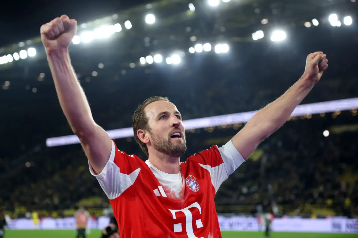 Harry Kane celebrates scoring for Bayern Munich against Borussia Dortmund in the Bundesliga.