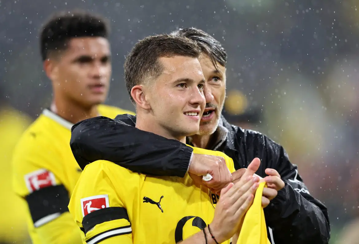 Borussia Dortmund's Konstantinos Karetsas celebrates his first Bundesliga victory.