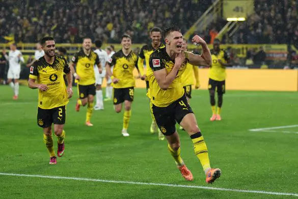 Nico Schlotterbeck celebrates scoring for Borussia Dortmund against Hoffenheim in Matchday 13 of the Bundesliga.