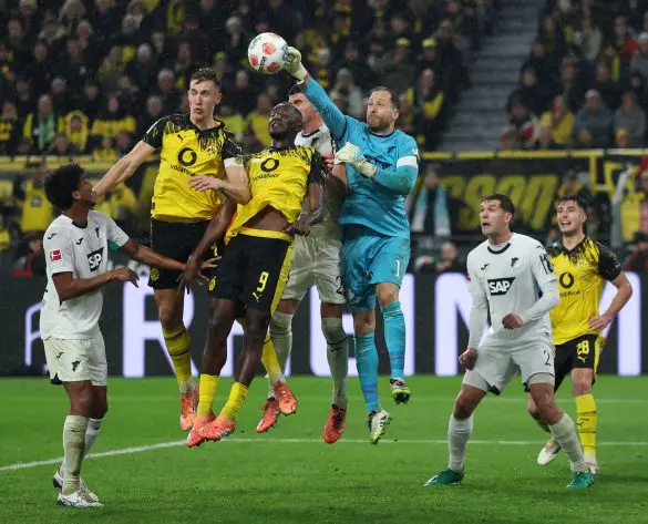 Borussia Dortmund and Hoffenheim players clash.