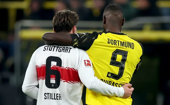Stuttgart and Dortmund players during a Bundesliga match.