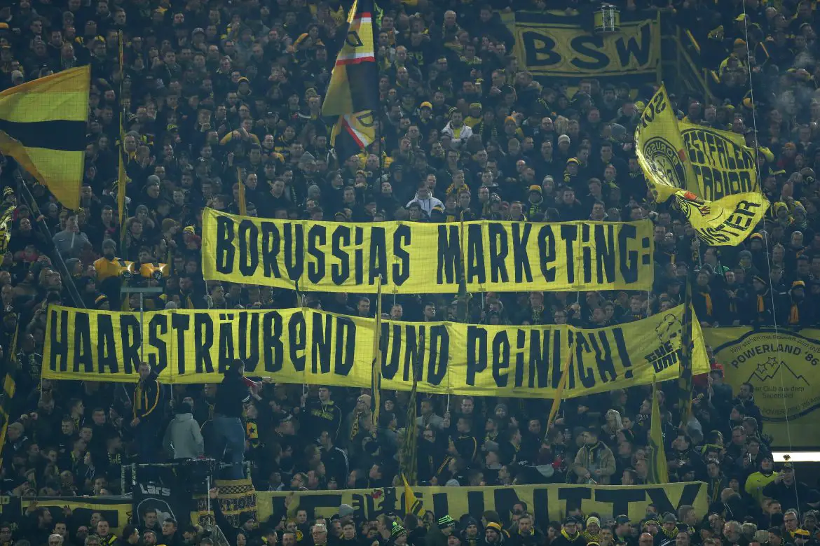 Borussia Dortmund fans engage in a protest action.