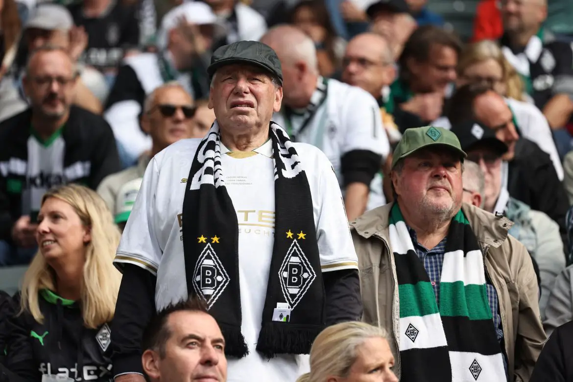 Borussia Mönchengladbach fans watch their Bundesliga team in action on Saturday afternoon.