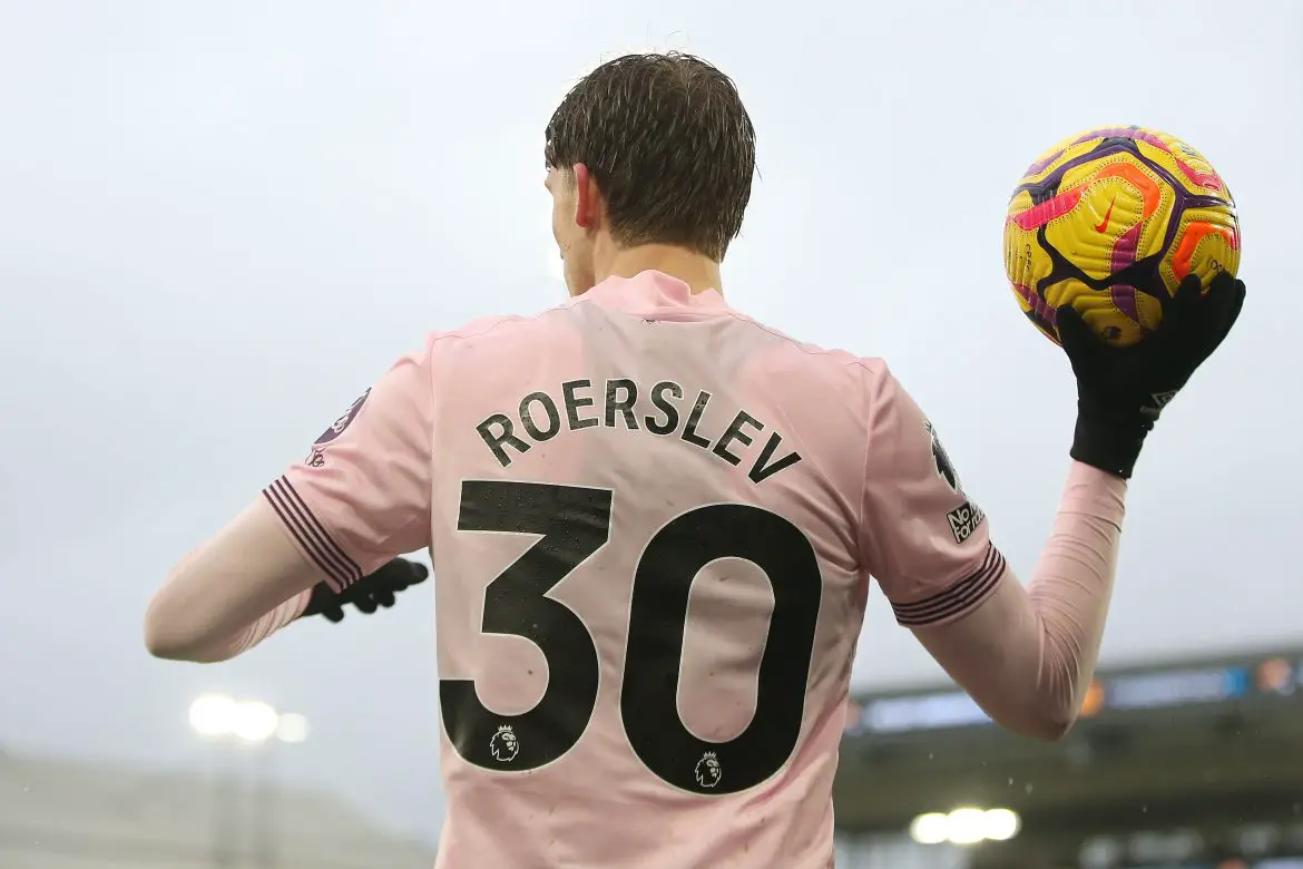 Mads Roerslev taking a throw in for Brentford.