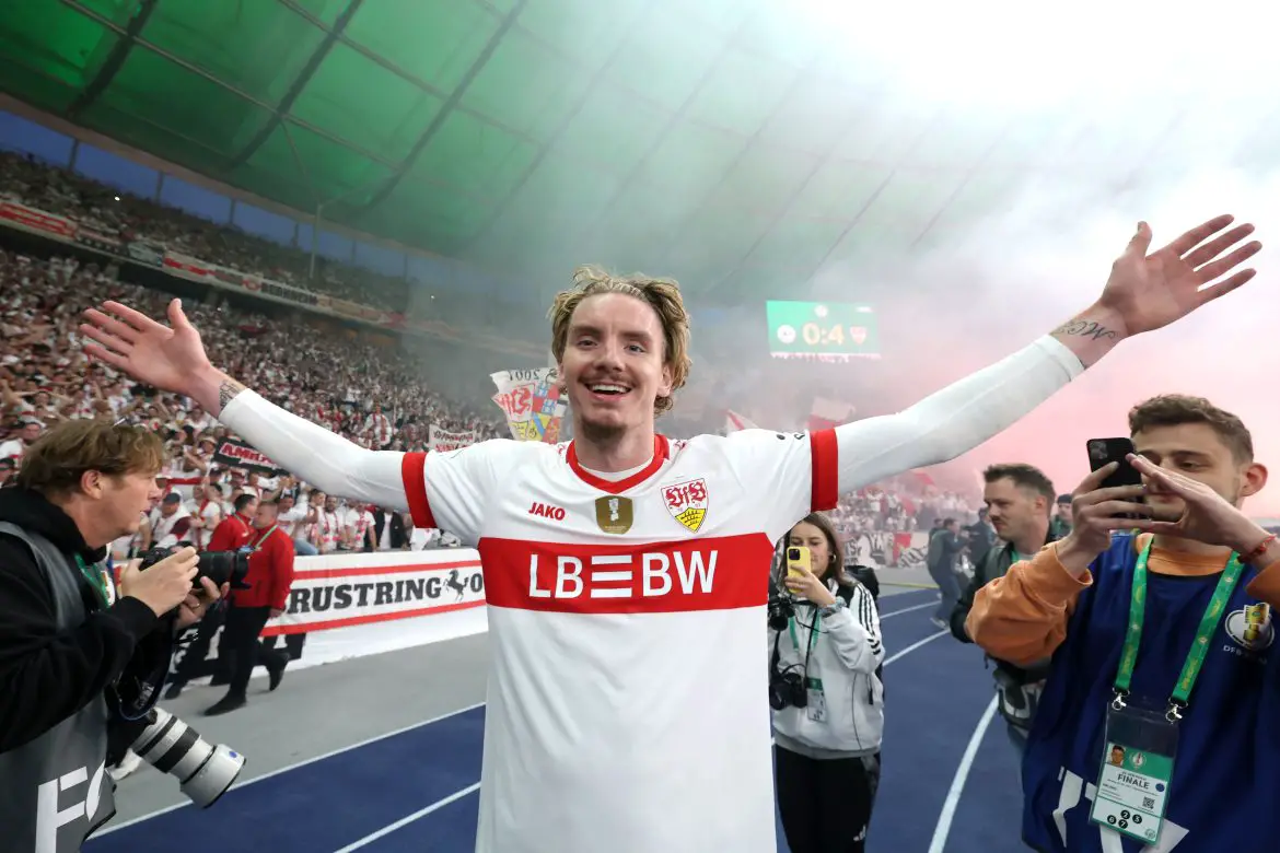 Nick Woltemade celebrates winning the DFB Pokal in front of the Stuttgart fans in Berlin.