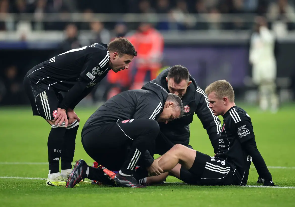 Eintracht Frankfurt striker Jonathan Burkardt receiving treatment in the Champions League last night.