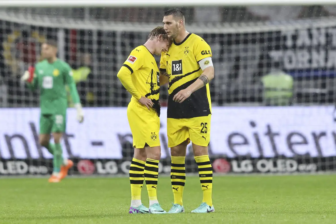 Julian Brandt and Niklas Süle in action for Borussia Dortmund.