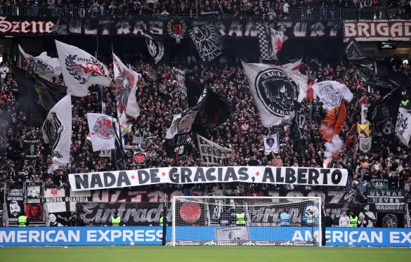 Eintracht Frankfurt fans hold up a banner protesting the performance of then head coach Albert Riera during their final Bundesliga match last season.