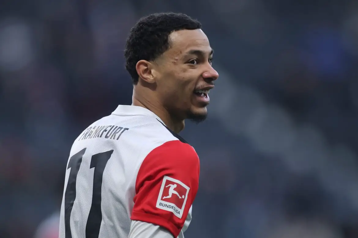 Hugo Ekitike of Eintracht Frankfurt is all smiles in a Bundesliga game against Wolfsburg.