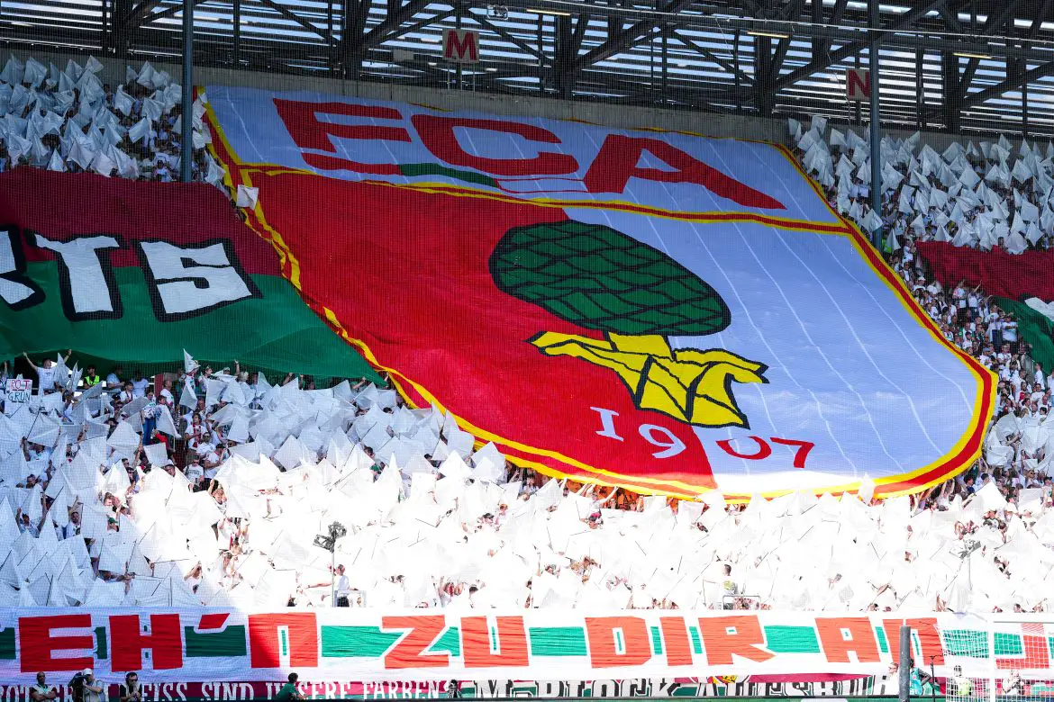 Fans of FC Augsburg support their Bundesliga club.