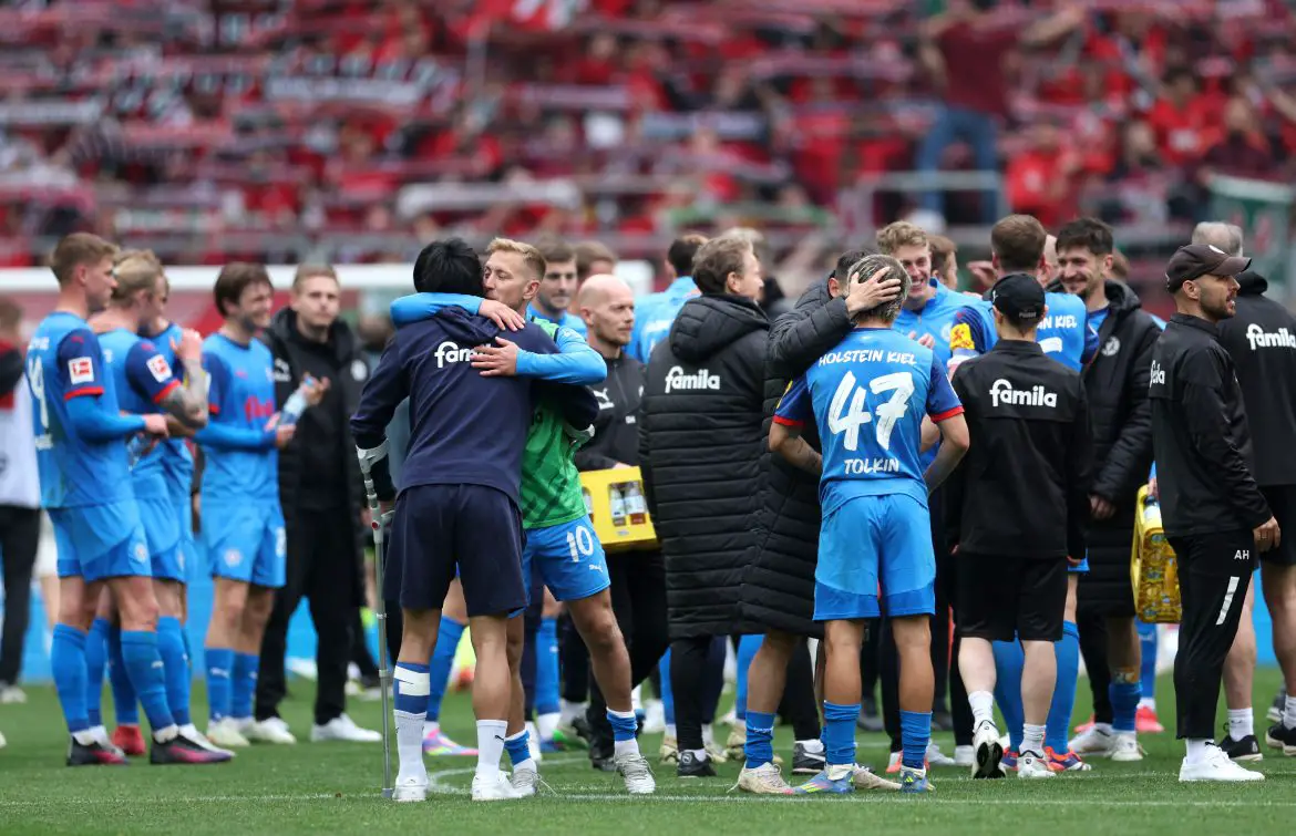 Holstein Kiel celebrate their latests Bundesliga victory Sunday at the WWK-Arena.
