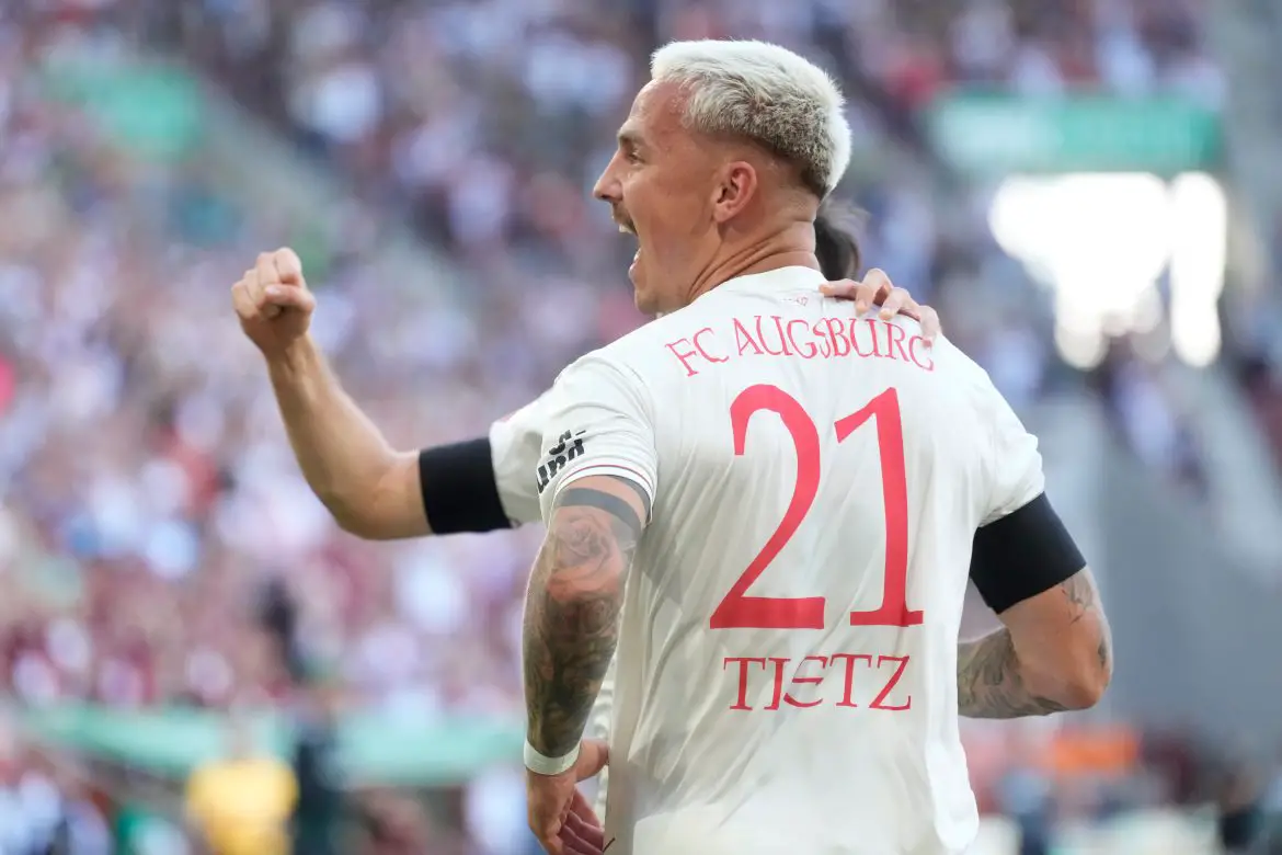 Augsburg striker Philipp Tietz with the blonde-dye job that seems to bring him luck.