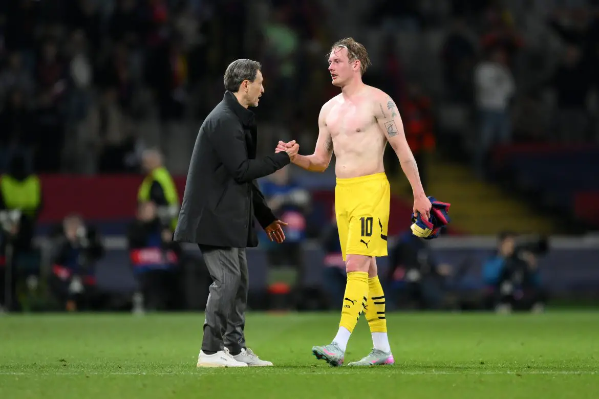 Borussia Dortmund trainer Niko Kovac and BVB attacker Julian Brandt shake hands after a Champions League fixture last spring.