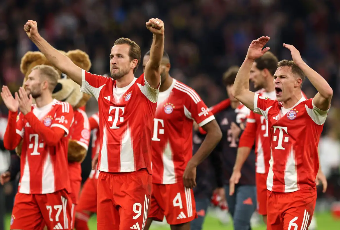 Harry Kane and Joshua Kimmich celebrate Bayern Munich's Klassiker win against Borussia Dortmund in the Bundesliga.