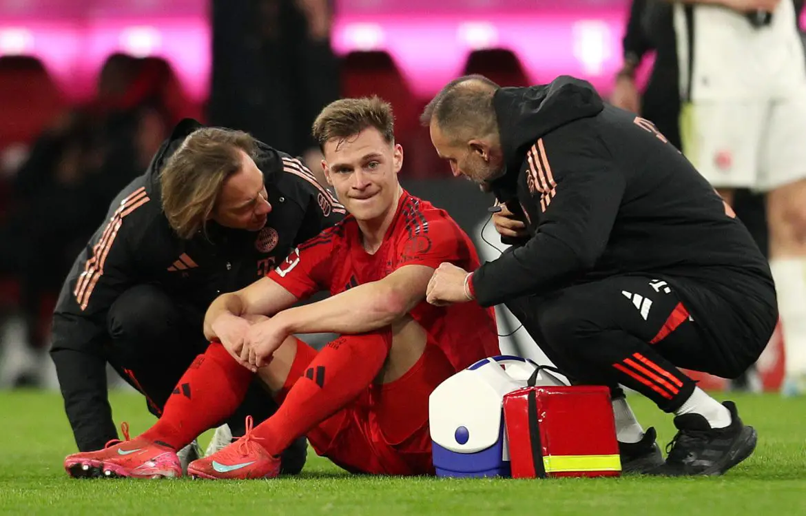 Bayern Munich's Joshua Kimmich sat down after suffering an injury in the Bundesliga.