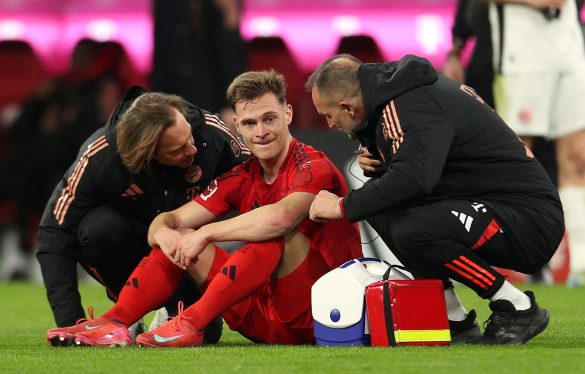 Bayern Munich's Joshua Kimmich sat down after suffering an injury in the Bundesliga.