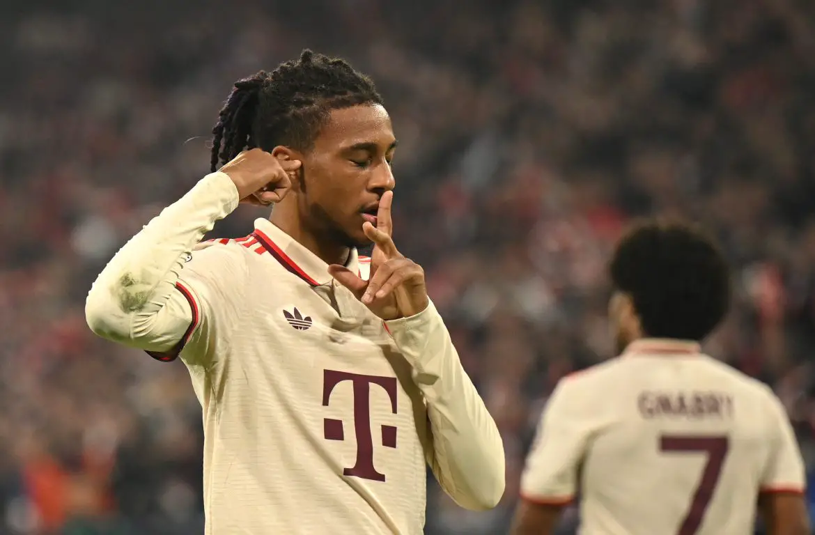 Michael Olise celebrates scoring for Bayern Munich.