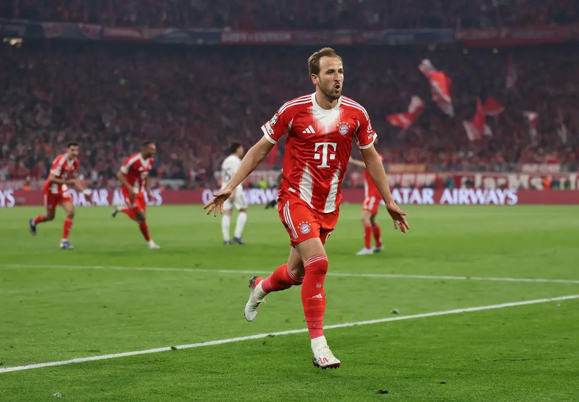 Harry Kane celebrates scoring his 12th UEFA Champions League goal of the season for Bayern Munich.