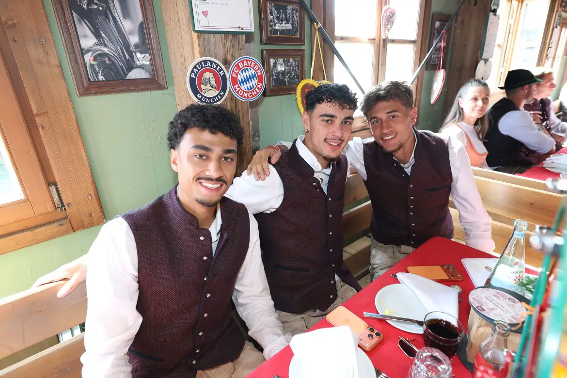 Bayern Munich and German national team call ups Nathaniel Brown (left), Aleksandar Pavlovic (center) and Tom Bischof (right) during their Bundesliga club's annual Oktoberfest outing.