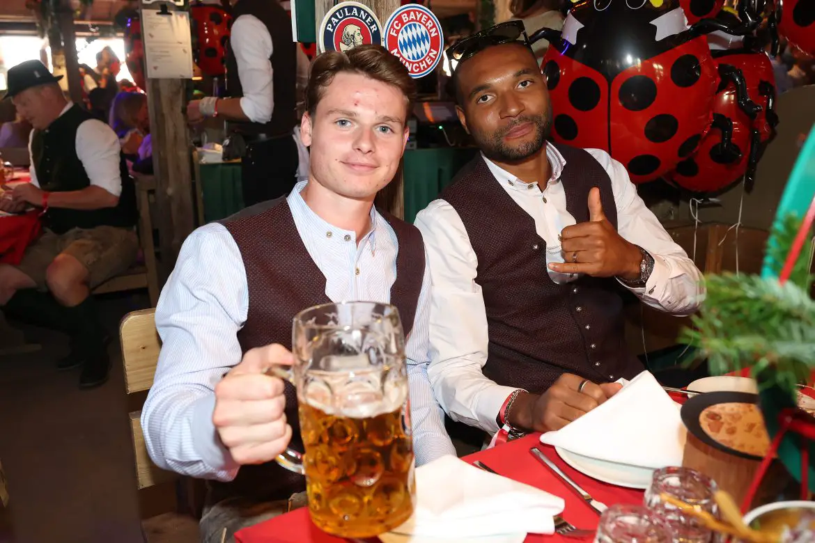 Bayern Munich keeper and Germany call up Jonas Urbig (left) celebrates with club teammate Jonathan Tah during this weekend's FCB Oktoberfest outing.