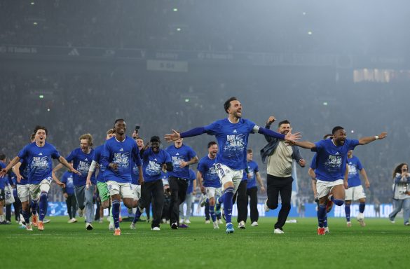Schalke celebrate after securing their return to the Bundesliga.
