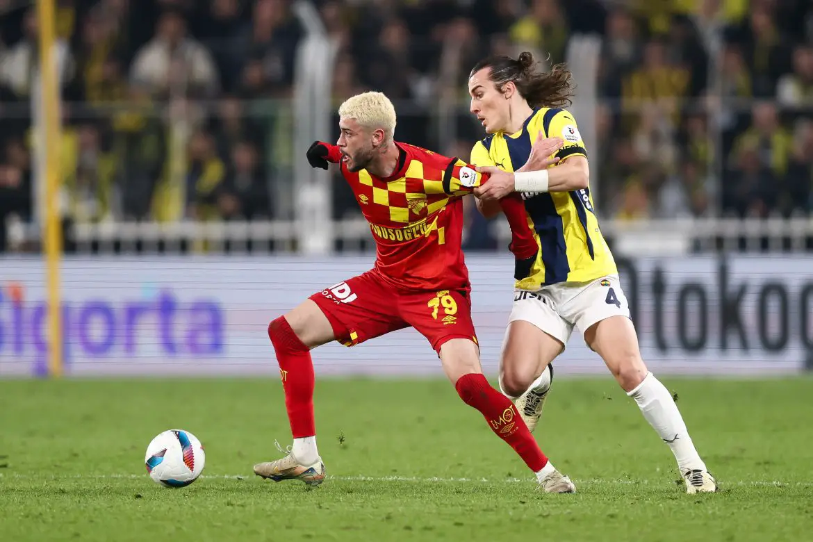 Romulo of Goztepe is challenged by Caglar Soyuncu of Fenerbahce during to the Turkish Super League match between Fenerbahce and Goztepe.