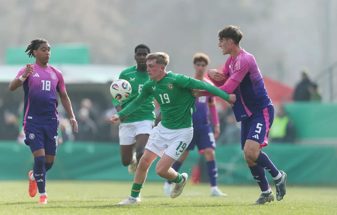 Irish striker Michael Noonan (center, #19) playing against Germany at U19 level.