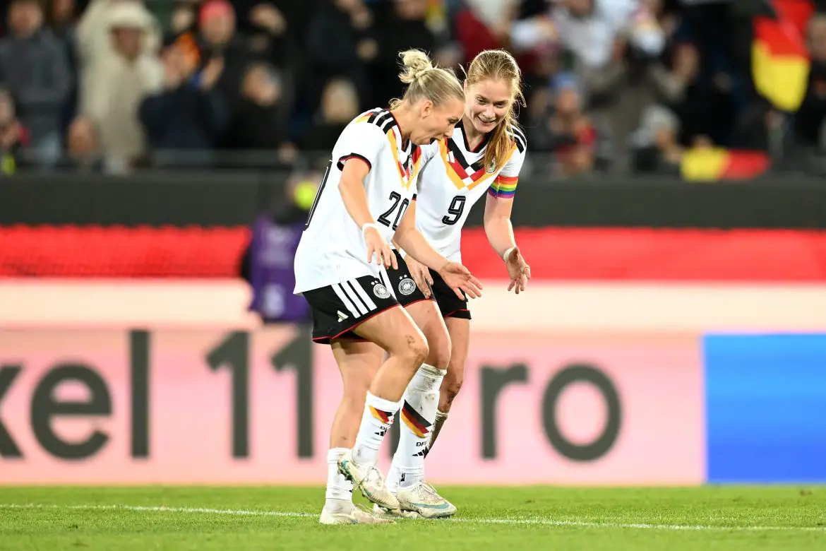 Germany internationals Elisa Senß (left) and Sjoeke Nüsken (right) celebrate scoring for their country.
