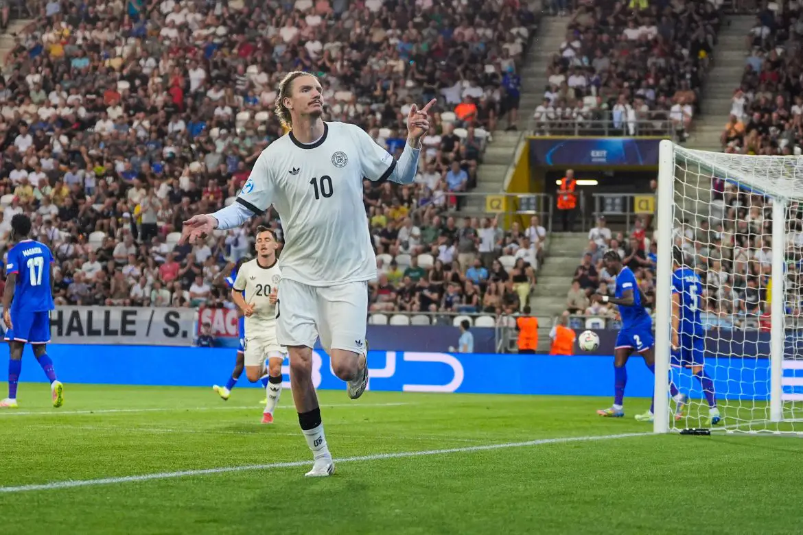 Nick Woltemade celebrates scoring Germany's second against France in the UEFA European U21 Championship.