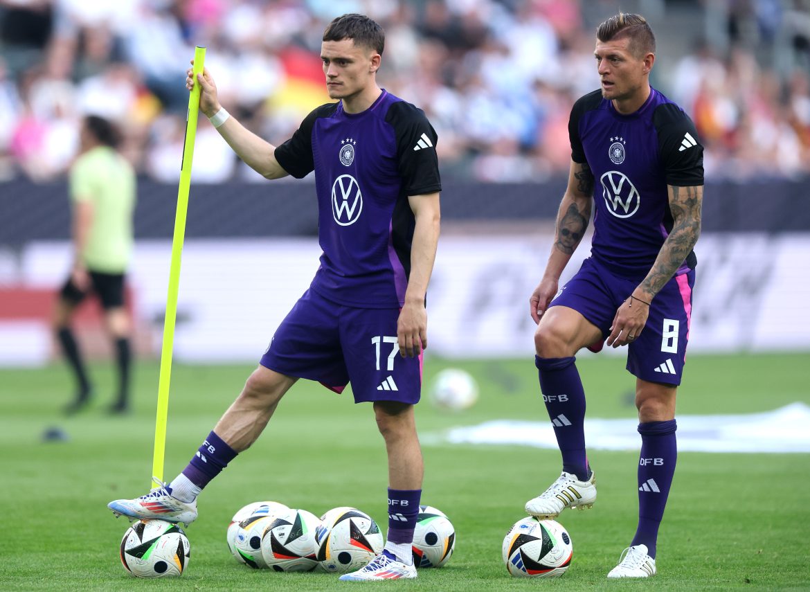 New Liverpool signing Florian Wirtz alongside Toni Kroos.