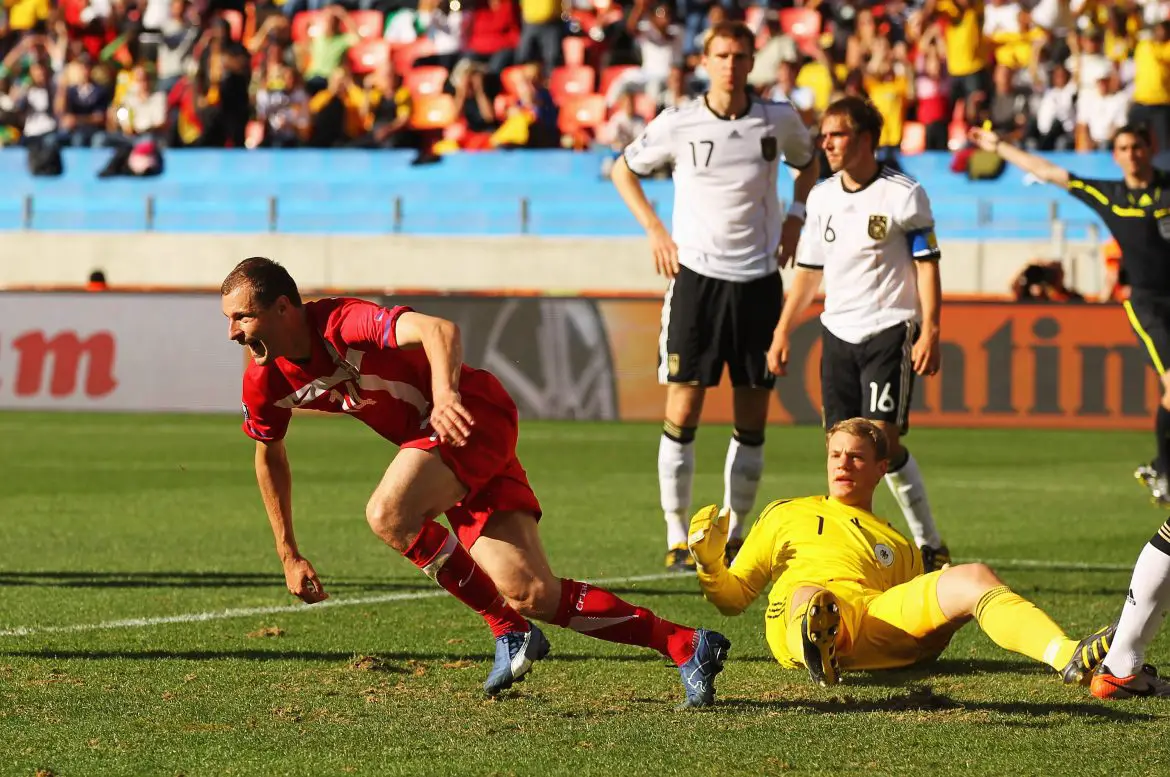 Milan Jovanovic - seen here celebrating his famous 2010 World Cup goal against Germany - is now moving to Germany to help his son Lazar build his Bundesliga career.