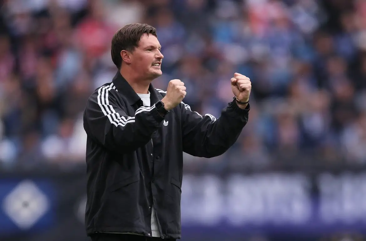 Hamburg head coach Merlin Polzin celebrates his first Bundesliga win on Saturday afternoon.
