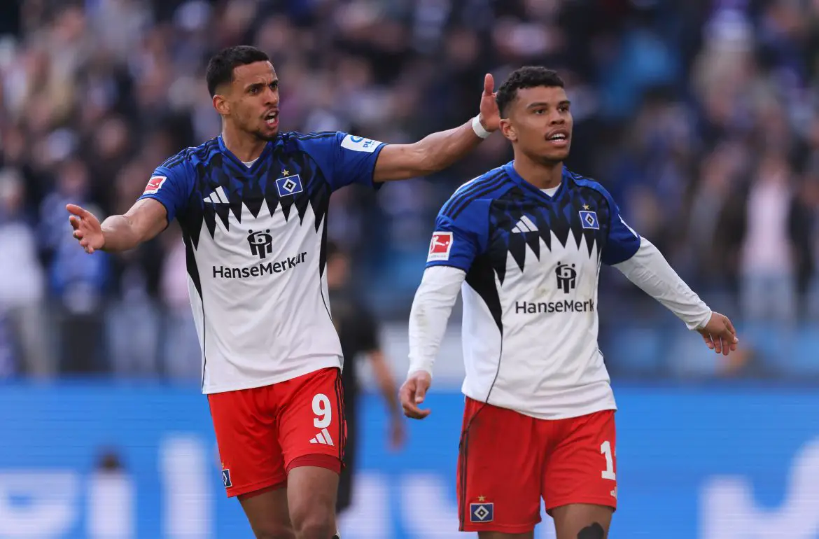 Hamburg's Robert Glatzel (left) and Ransford-Yeboah Königsdörffer (right) celebrate scoring a crucial equalizer in a 1-1 Bundesliga draw with Augsburg on Saturday.