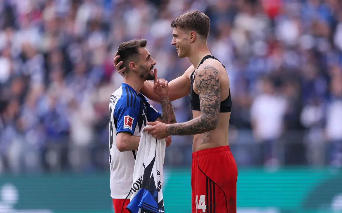 Fabio Vieira (left) and Luka Vuskovic (right) celebrate after their final home match as Hamburg teammates in the Bundesliga.