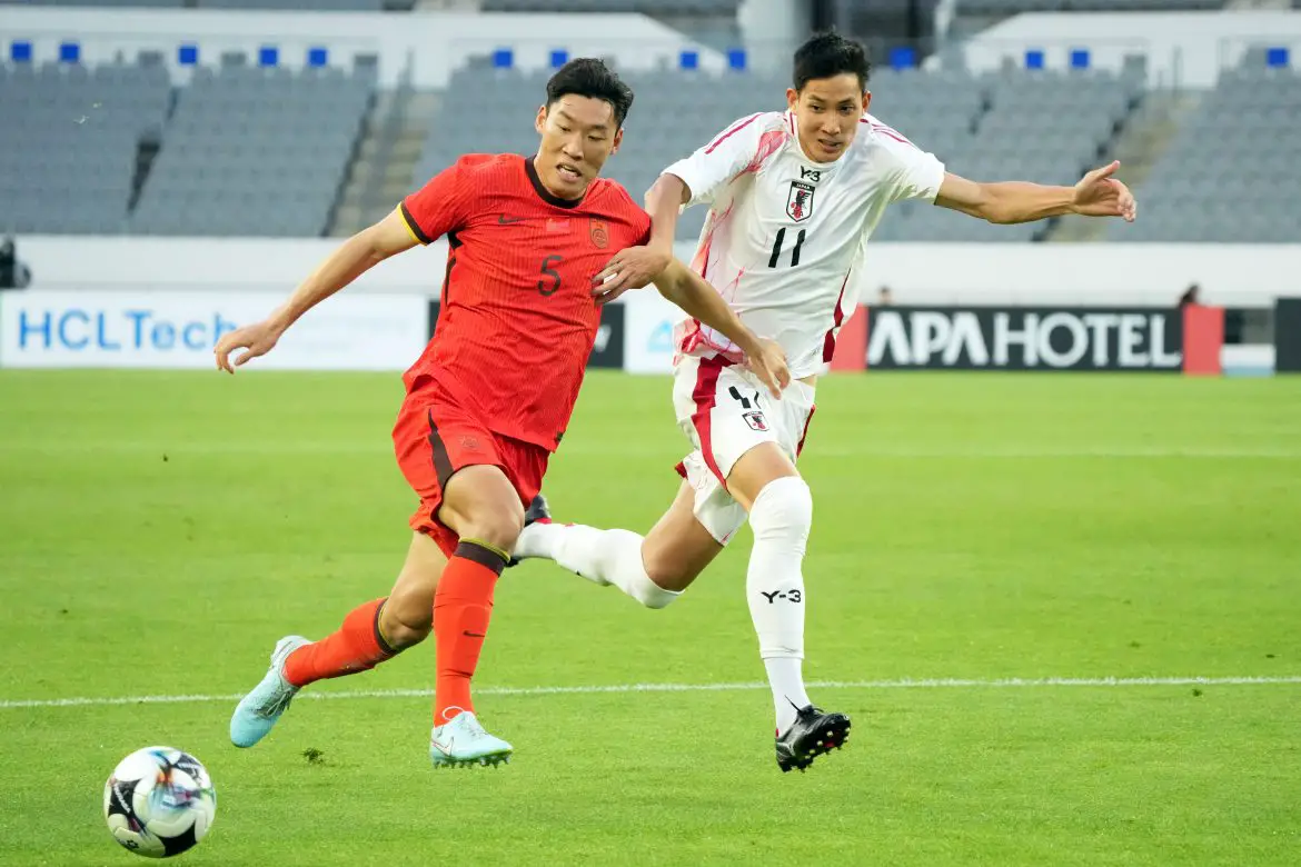 New St. Pauli signing Taichi Hara (right, in white) representing Japan internationally.