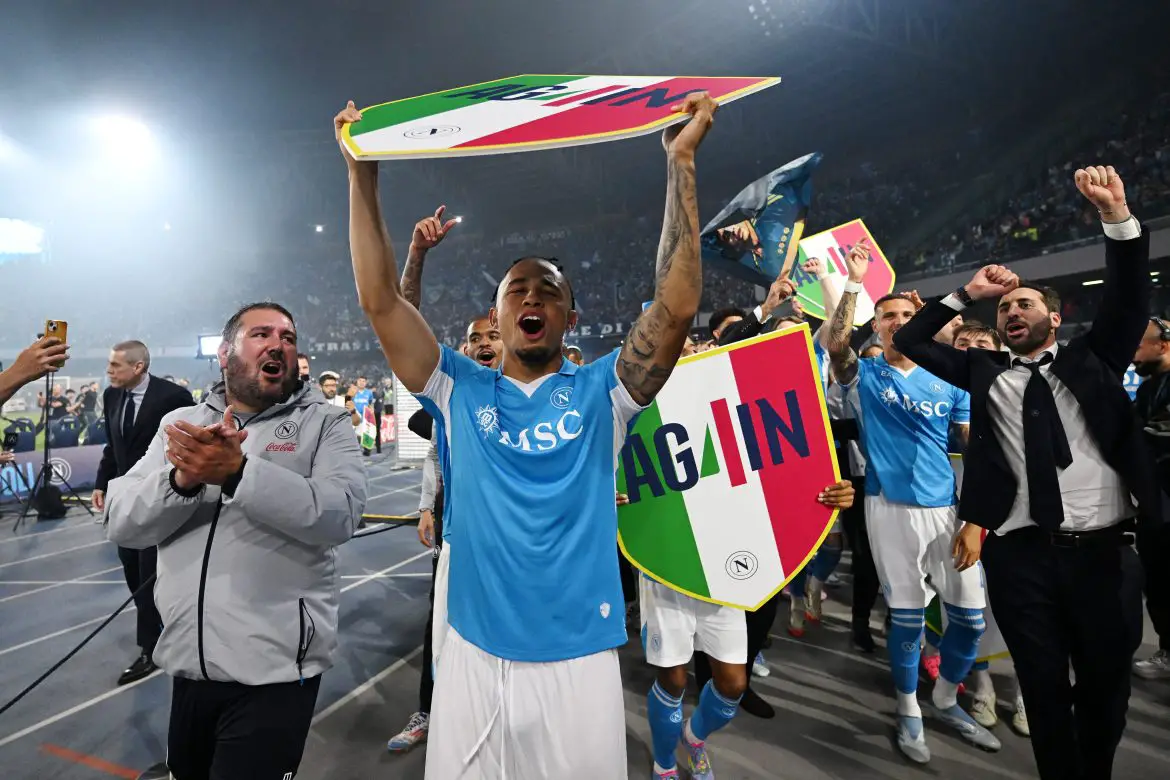 Noah Okafor celebrates lifting the Serie A title with Napoli.