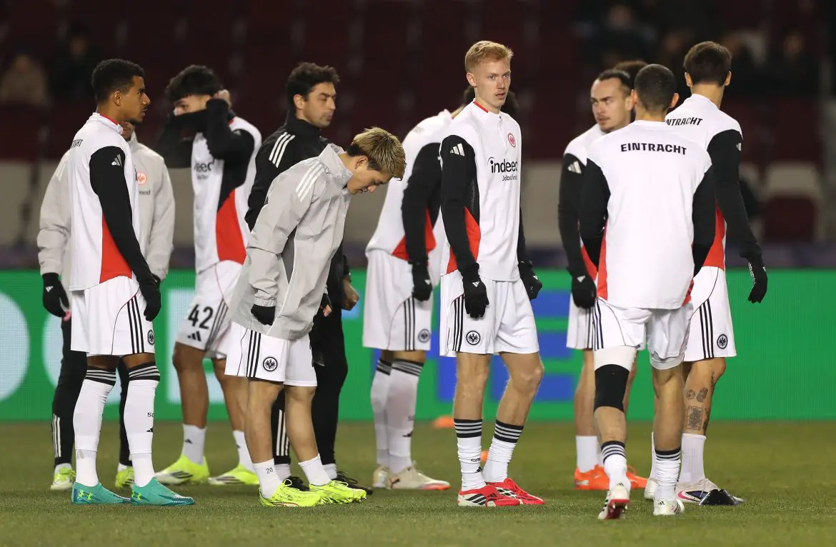 Eintracht Frankfurt players warm up prior to Tuesday night's Champions League fixture.