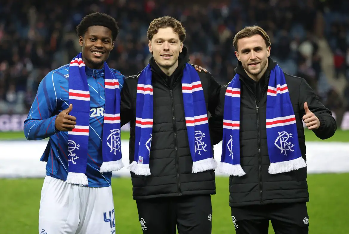 Wolfsburg's Andreas Skov Olsen (center) being unveiled as a new Rangers signing on Friday night.