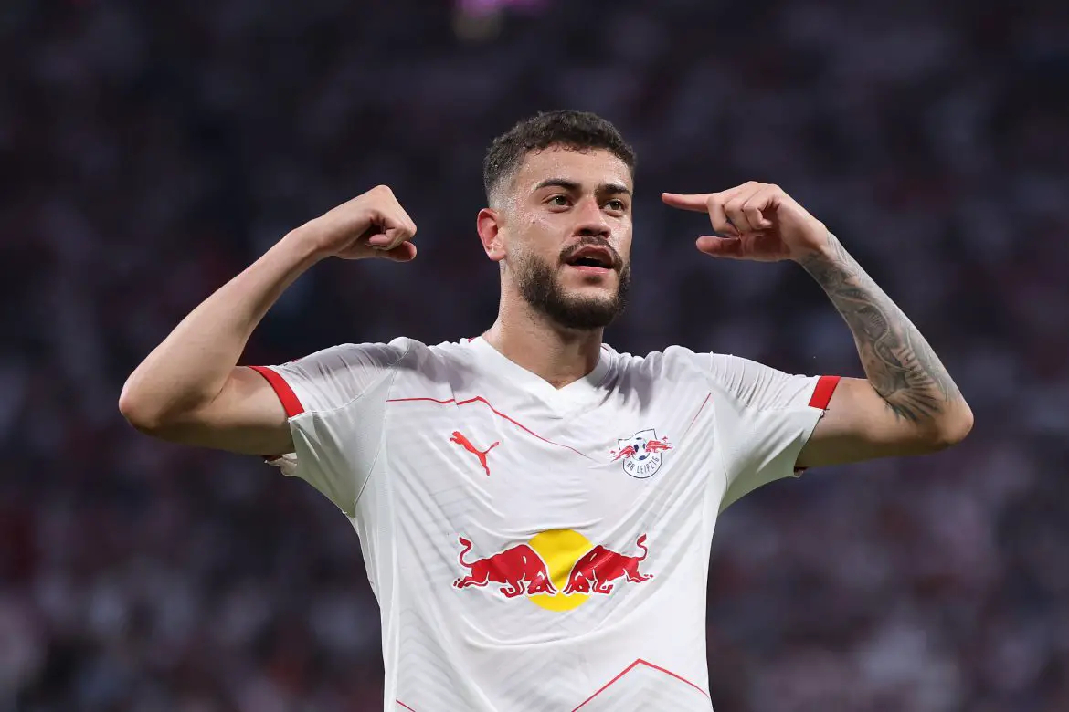 Rômulo celebrates scoring for RB Leipzig against Cologne.