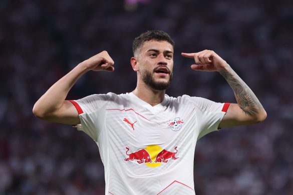 Rômulo celebrates scoring for RB Leipzig against Cologne.