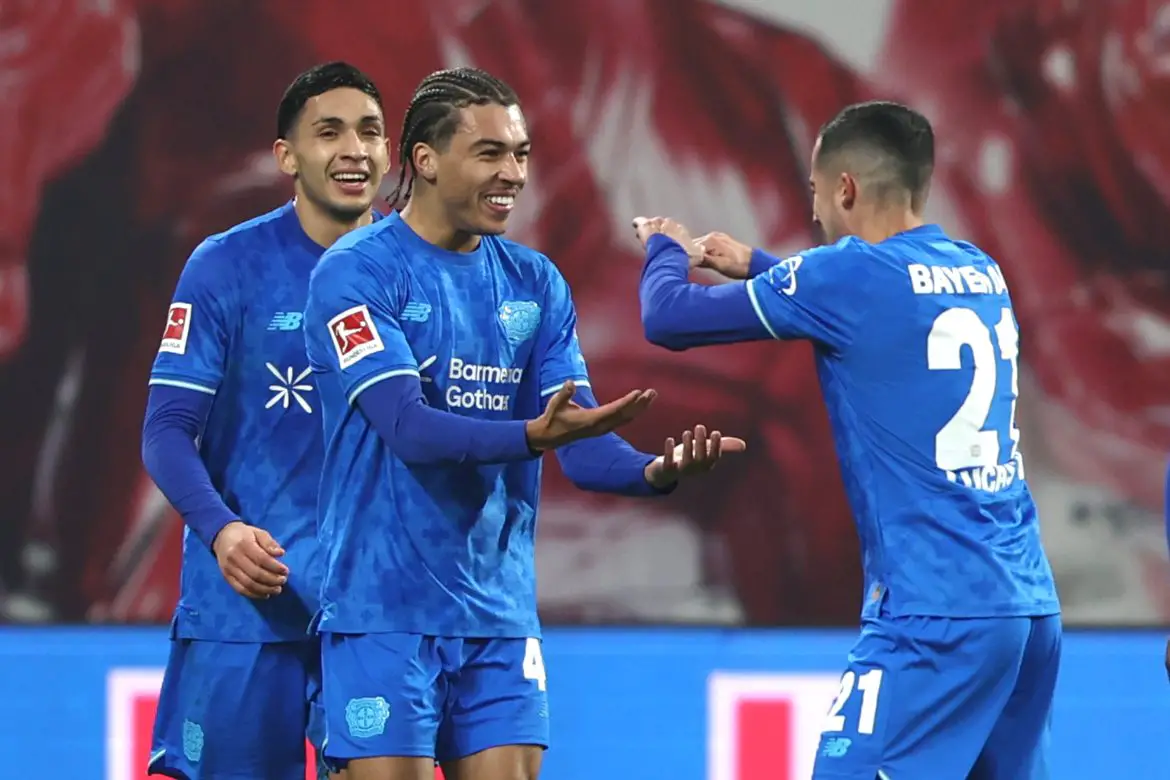 Bayer Leverkusen players celebrate after scoring against RB Leipzig